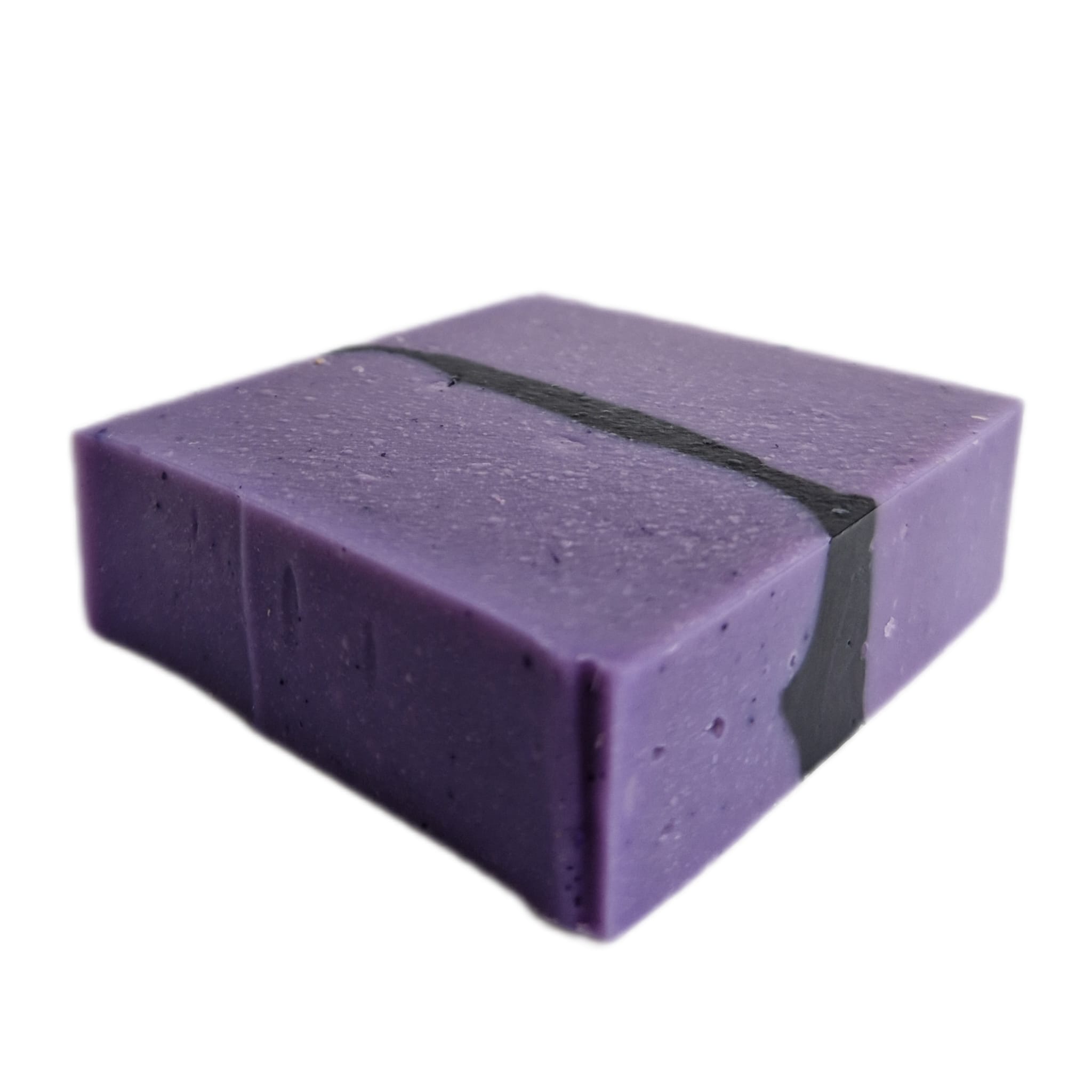 Vierkante zeepbar van opzij gezien, die schuin gedraaid ligt. Lichtpaars van kleur met een zwarte streep in het midden.